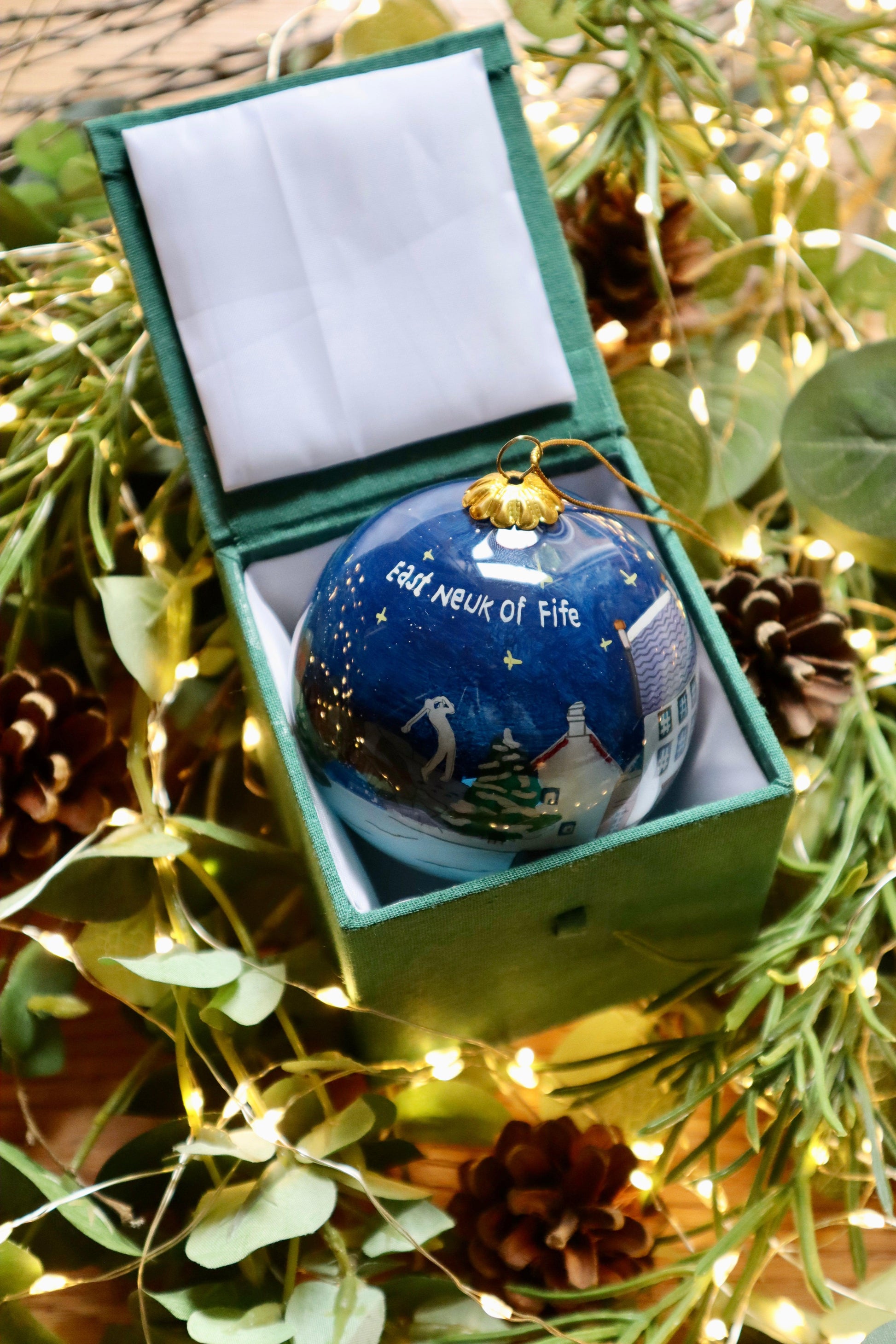 Hand-painted blue Christmas ornament in a green gift box for East Neuk Scottish Christmas decoration bauble
