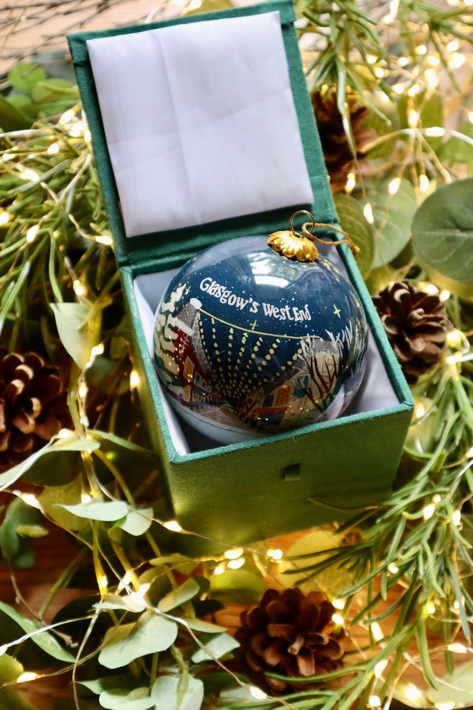 Dark blue Glasgow West End Scottish Christmas decoration bauble in green velvet box